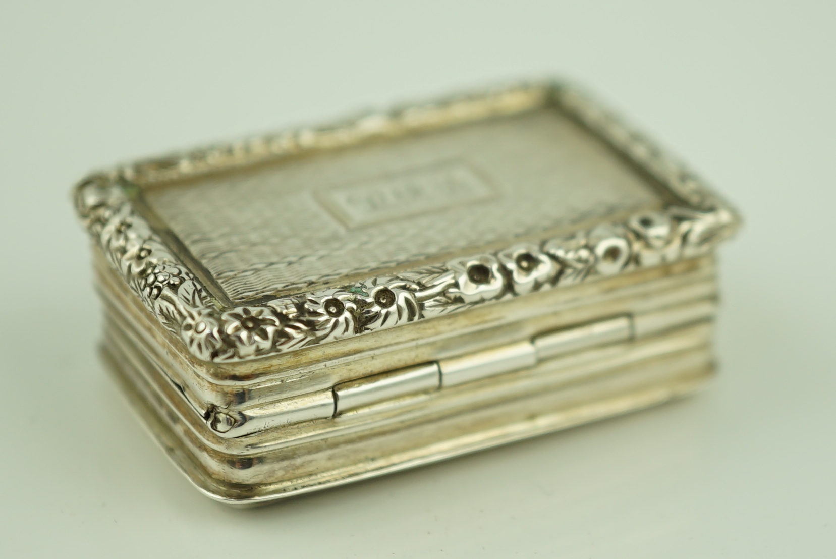 A George IV engine turned silver rectangular vinaigrette, Thomas & William Simpson